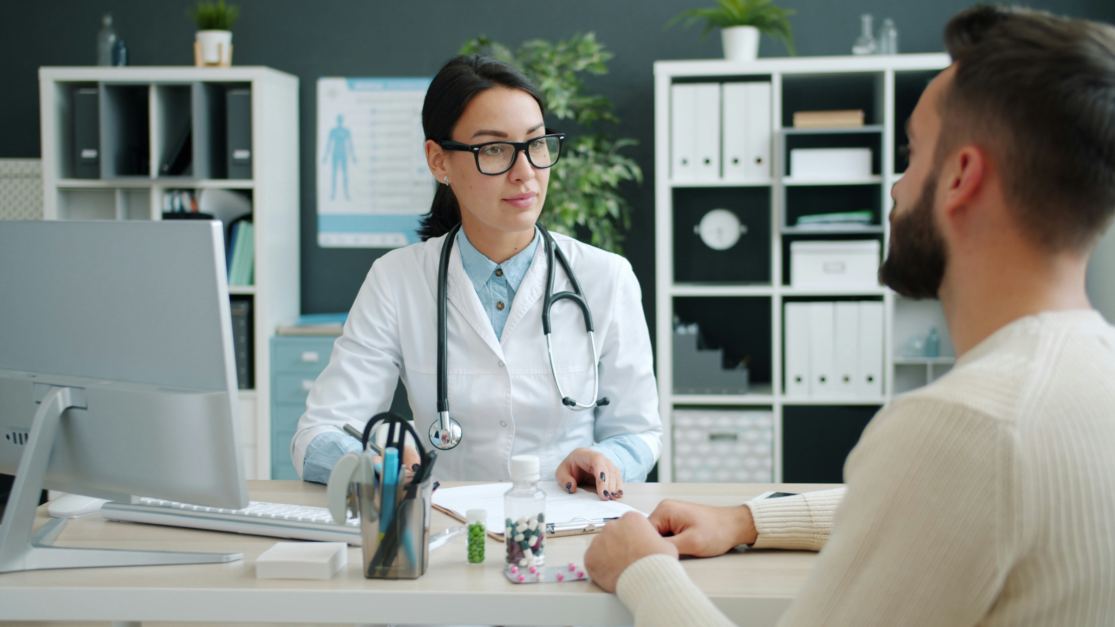 Doctor speaking with a patient in a modern clinic